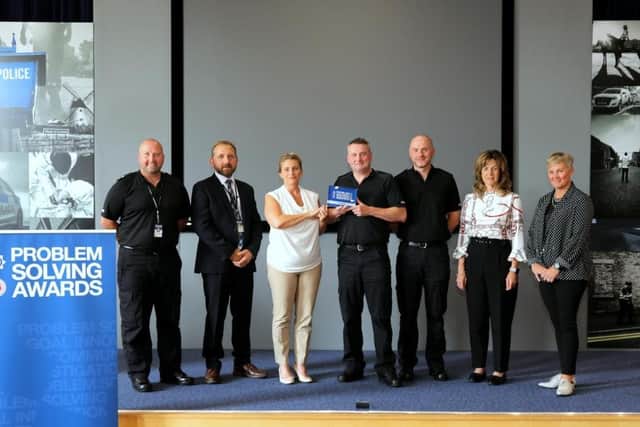 Pictured at the POP awards are (left to right) Inspector Damian Pemberton, Detective Inspector Martin Melvin, Detective Sergeant Sheralyn Melton, Sergeant Rob Grey, Police Constable Chris McKee, Rachel Tuffin OBE (Director of Knowledge and Innovation, The College of Policing), Angela Harrison (CEO, Office of the Police and Crime Commissioner).