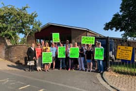 Residents protested in front of the former short stay education facility, known as the Isaac Centre, where plans to knock it down and build 44 homes have been  refused by Burnley Council