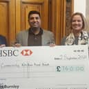 Phil Jones (Director of New Services at The Calico Group), Lord Wajid Khan, and Dr. Sarah Ward (Chief Executive of Burnley FC in the Community)