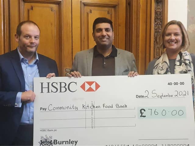 Phil Jones (Director of New Services at The Calico Group), Lord Wajid Khan, and Dr. Sarah Ward (Chief Executive of Burnley FC in the Community)