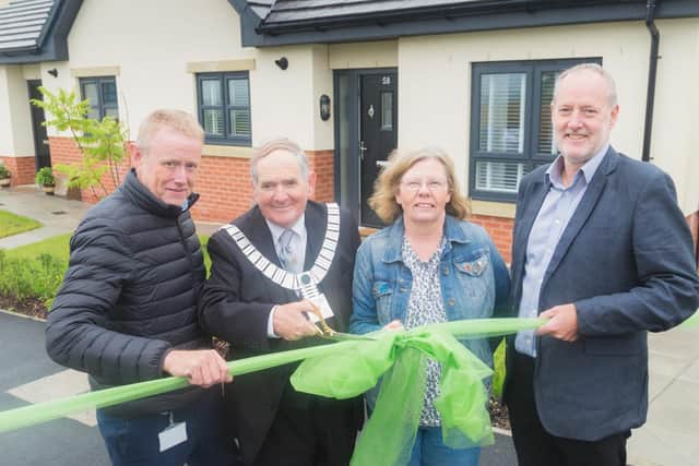 Ribble Valley Mayor Tony Austin, with (left to right) Mick Moorhouse, of Hargreaves Contracting; Petre Wood tenant Sonia Neville and Matthew Harrison, chief executive of Great Places Housing.