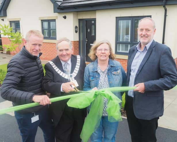 Ribble Valley Mayor Tony Austin, with (left to right) Mick Moorhouse, of Hargreaves Contracting; Petre Wood tenant Sonia Neville and Matthew Harrison, chief executive of Great Places Housing.