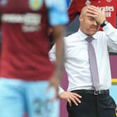 Burnley's English manager Sean Dyche reacts on the touchline during the English Premier League football match between Burnley and Arsenal at Turf Moor in Burnley, north west England on September 18, 2021.