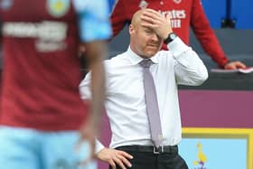 Burnley's English manager Sean Dyche reacts on the touchline during the English Premier League football match between Burnley and Arsenal at Turf Moor in Burnley, north west England on September 18, 2021.