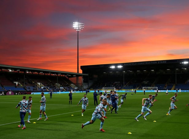 Players of Burnley warm up ahead of the Carabao Cup Third Round match between Burnley and Rochdale at Turf Moor on September 21, 2021 in Burnley, England.