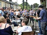 Picture by Julian Brown 27/08/16 Crowds watch buskers perform Great British Rhythm and Blues Festival, Colne