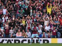 Burnley player Maxwel Cornet and the Burnley fans react after a chance is missed during the Premier League match between Burnley and Arsenal at Turf Moor on September 18, 2021 in Burnley, England.