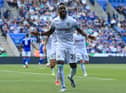 Burnley's Ivorian defender Maxwel Cornet celebrates scoring his team's second goal during the English Premier League football match between Leicester City and Burnley at King Power Stadium in Leicester, central England on September 25, 2021.