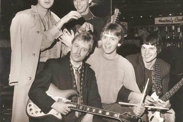 Colin (front row second from left) with members of No Comment, the band he joined when he was 18.