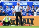 Sean Dyche, Manager of Burnley gives instructions to his players during the Premier League match between Leicester City and Burnley at The King Power Stadium on September 25, 2021 in Leicester, England.