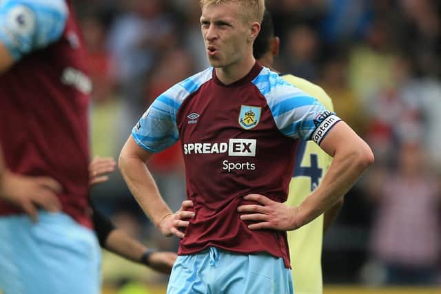 Burnley's English defender Ben Mee reacts on the final whistle in the English Premier League football match between Burnley and Arsenal at Turf Moor in Burnley, north west England on September 18, 2021. - Arsenal won the game 1-0.