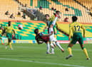 Chris Wood of Burnley scores his team's first goal during the Premier League match between Norwich City and Burnley FC at Carrow Road on July 18, 2020 in Norwich, England.