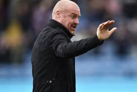Sean Dyche, Manager of Burnley acknowledges the fans prior to the Premier League match between Burnley and Norwich City at Turf Moor on October 02, 2021 in Burnley, England.