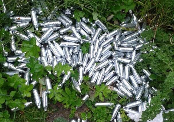 The discarded small silver canisters of nitrous oxide have become a common sight. This picture was sent in by a reader of a host of them discarded near Bamber Bridge, Preston