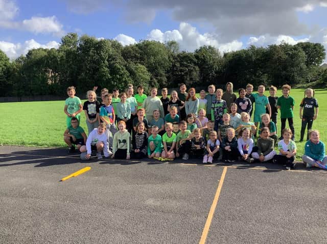 Children at St Mary Magdalene's RC Primary School in Burnley held a non uniform day and wore something green to as part of a climate related fund raising challenge