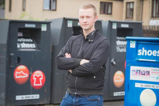 Ribble Valley Borough Council’s engineering assistant Daniel McCaffrey at supermarket textile recycling bank.