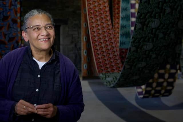 Lubaina Himid pictured at her exhibition at the  Great Barn at Gawthorpe Hall Photo: Huckleberry Films