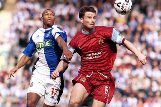 Marcus Bent of Blackburn Rovers tries to tackle Steve Davis of Burnley during the Nationwide League Division One game between Blackburn Rovers v Burnley at Ewood Park, Blackburn.