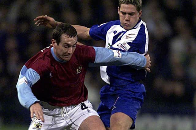 Mick Mellon of Burnley battles with David Dunn of Blackburn during the Burnley v Blackburn Rovers Nationwide Division One match at Turf Moor, Burnley.