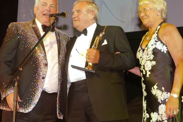Christopher Biggins with Lancastrian of the Year Philip McIvor and his wife Dorothy  at the BIBAs at Blackpool Tower Ballroom in February 2012
