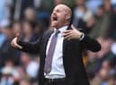 Burnley's English manager Sean Dyche gestures from the touchline during the English Premier League football match between Manchester City and Burnley at the Etihad Stadium in Manchester, north west England, on October 16, 2021.