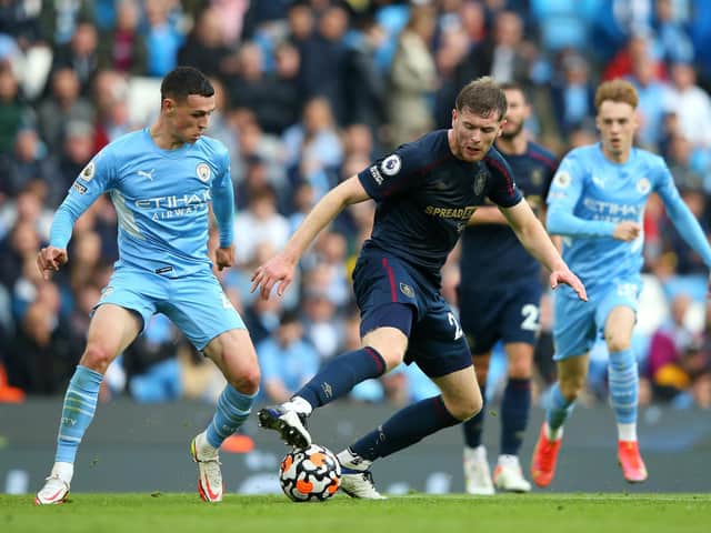 Nathan Collins dispossesses Phil Foden