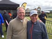 Wayne Johnson with legendary golf coach and commentator Butch Harmon
