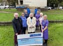 The Burnley League of Volunteers present a cheque to ELHT&Me