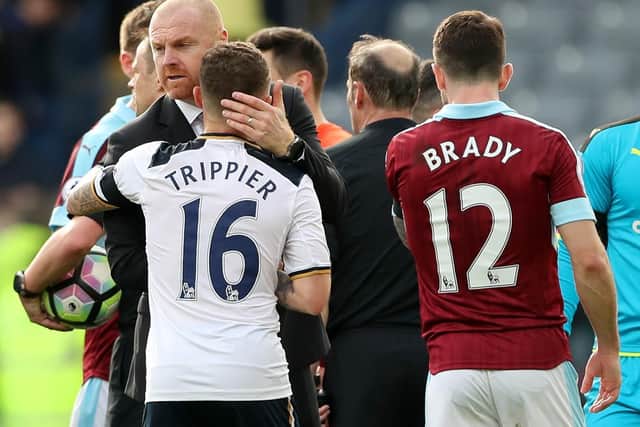 Kieran Trippier of Tottenham Hotspur and Sean Dyche, Manager of Burnley embrace after the Premier League match between Burnley and Tottenham Hotspur at Turf Moor on April 1, 2017 in Burnley, England.