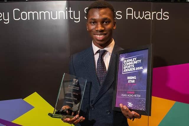 Rising star winner Osasu Agho-Peter with his award and certificate
