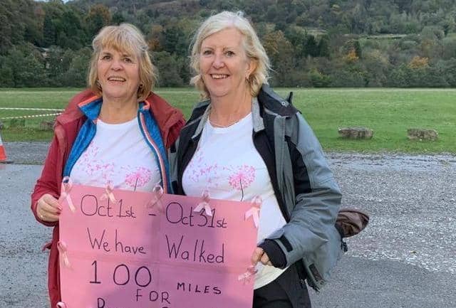 Freda (left) with her sister Susan after completing the challenge to walk 100 miles in a month