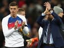 Nick Pope of England and Gareth Southgate manager of England show appreaction to the fans after the International friendly between England and Italy at Wembley Stadium on March 27, 2018 in London, England.