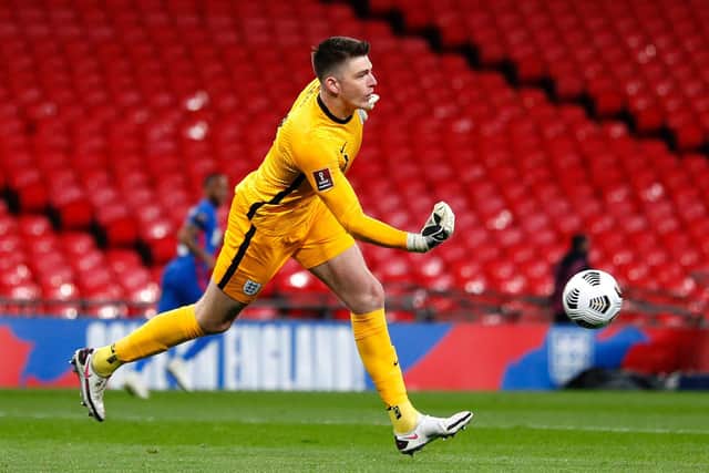 Nick Pope of England rolls the ball out during the FIFA World Cup 2022 Qatar qualifying match between England and San Marino at Wembley Stadium on March 25, 2021 in London, England.