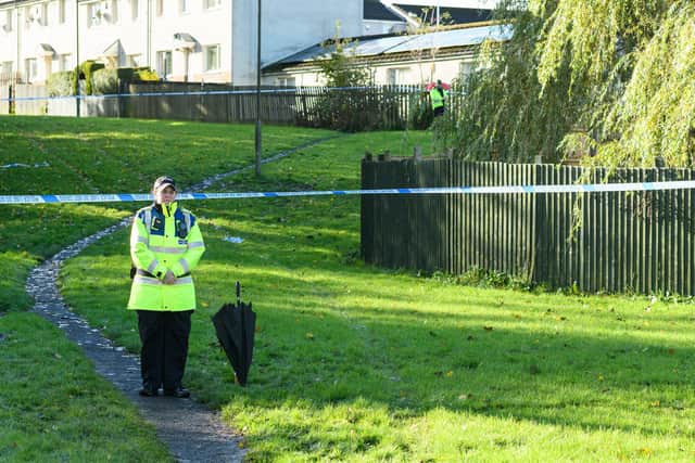 A police officer at the scene off Accrington Road this morning