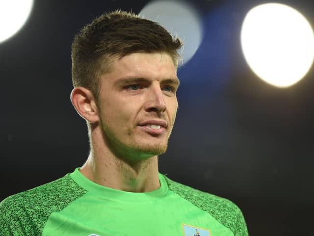 Burnley's English goalkeeper Nick Pope looks on during the English Premier League football match between Everton and Burnley at Goodison Park in Liverpool, north west England on September 13, 2021.