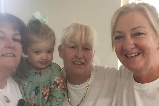 Raising funds for charity Rosemere Cancer Foundation with their pop up shop are, from the left, Joann with granddaughter Molly, Wendie and Julie