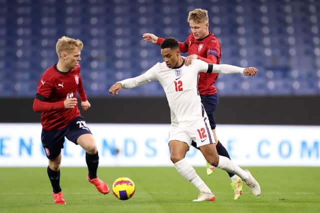 Jacob Ramsey of England holds off Adam Karabec of Czech during the UEFA European Under-21 Championship Qualifier match between England U21s and Czech Republic U21s on November 11, 2021 in Burnley, England.