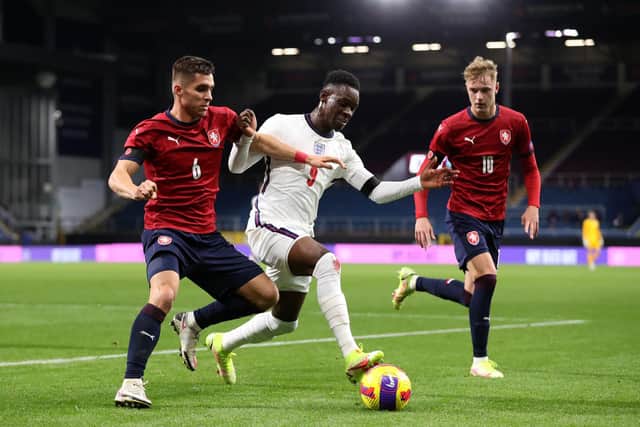Folarin Balogun of England holds off Michal Fukala of Czech during the UEFA European Under-21 Championship Qualifier match between England U21s and Czech Republic U21s on November 11, 2021 in Burnley, England.