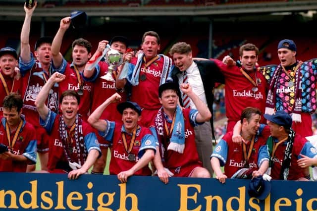 John Pender, front row, centre, captained Burnley to promotion in 1992 and again, here at Wembley in 1994