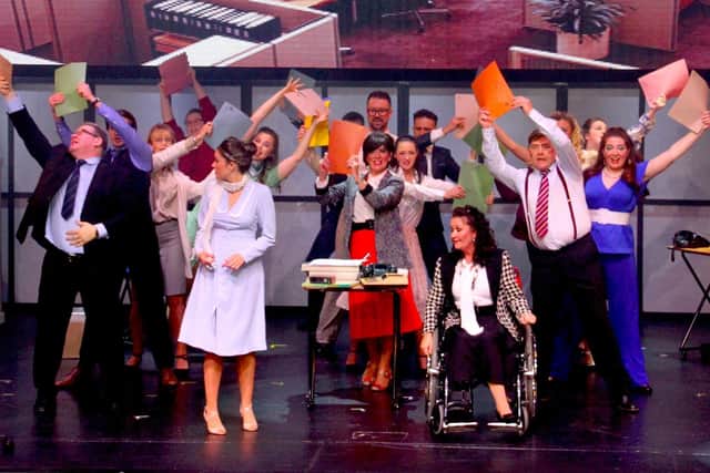 The cast of Burnley Light Opera Society perform 9 to 5 The Musical