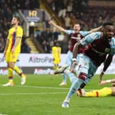 Maxwel Cornet of Burnley celebrates after scoring their team's third goal during the Premier League match between Burnley and Crystal Palace at Turf Moor on November 20, 2021 in Burnley, England.