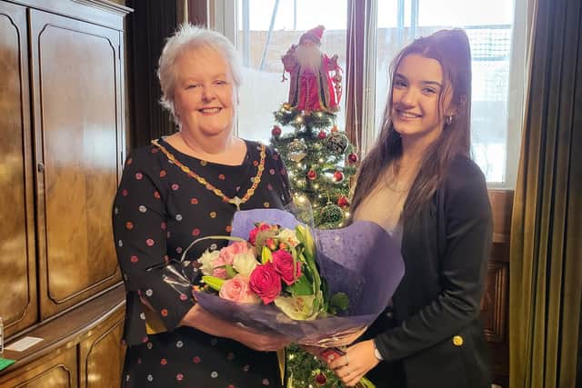 Lamissah surprised the mayoress by presenting her with a bouquet of flowers