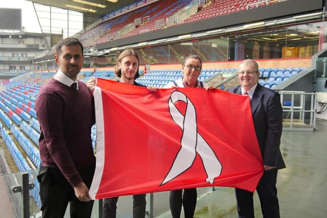 Burnley Council Leader Coun. Afrasiab Anwar, Michael Colquhoun (Head of Community Welfare and Inclusion, Burnley FC in the Community), Sharon Swindells (Safeguarding Officer, Burnley FC in the Community) and Matt Williams (Chief, Operating Officer, Burnley Football Club) are backing the White Ribbon campaign