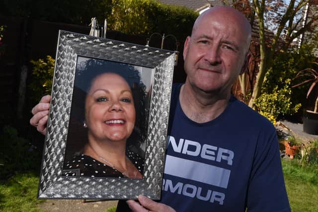 Ian Barlow with a picture of his "hero" wife