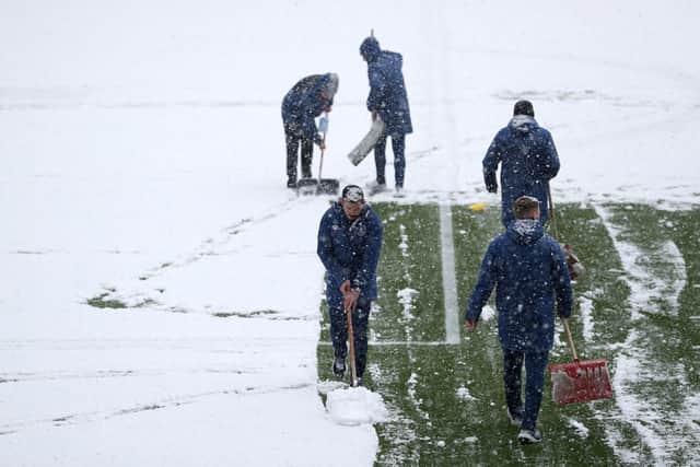 Efforts to clear the pitch