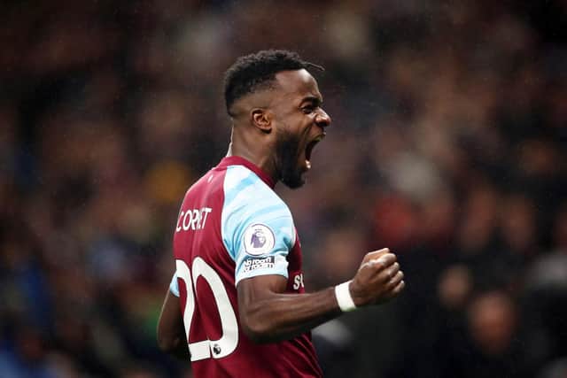 Maxwel Cornet of Burnley celebrates after scoring their team's third goal during the Premier League match between Burnley and Crystal Palace at Turf Moor on November 20, 2021 in Burnley, England.