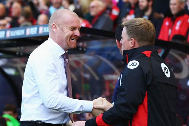 Sean Dyche, Manager of Burnley and Eddie Howe, Manager of AFC Bournemouth shake hands prior to the Premier League match between AFC Bournemouth and Burnley at Vitality Stadium on May 13, 2017 in Bournemouth, England.