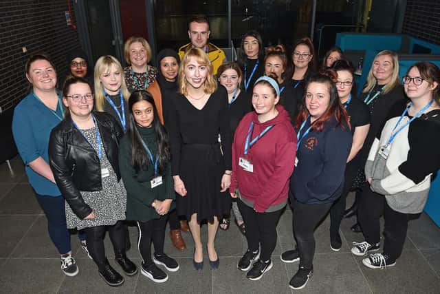 Abigail Brown (centre) from Burnley, is pictured with Students and Staff during the Early Childhood Studies Symposium at Blackburn University Centre