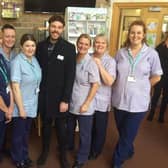 Jordan North with some of the staff at Pendleside Hospice where he is a celebrity ambassador