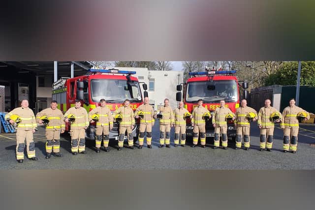 Lucy (far right) and the rest of Green Watch at Burnley Community Fire Station